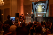 Someone speaking at the Worthwhile Fall Gala