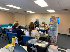 Event for human trafficking survivors happening in a classroom