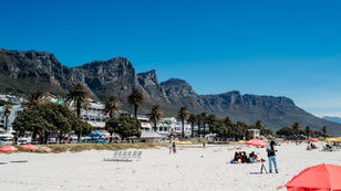 • Family spending time together at Camps Bay Beach in Cape Town.
• The family is strolling along Camps Bay, with the mountains providing a picturesque backdrop.
• The family enjoys moments together at Muizenberg Beach, surrounded by colorful beach huts.
• Kids playing near the ocean at Muizenberg Beach.
• Family enjoying a sunny beach day in Cape Town.
• Relaxed family photo on the sand at Camps Bay.
• Family beach walk along Cape Town’s coastline.