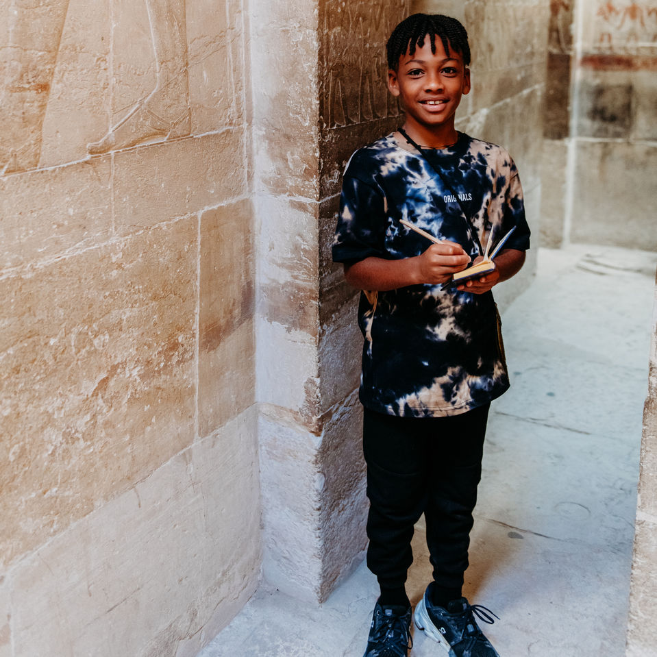 Pyramid & Structures:
• Step Pyramid of Djoser in Saqqara, Egypt.
• Wide view of the Step Pyramid rising over the desert.
• Ancient stone structure at the Saqqara archaeological site.
• Entrance to tombs at Saqqara’s necropolis.
• Saqqara pyramid complex under clear sky.

Tombs & Carvings:
• Hieroglyphic carvings inside a Saqqara tomb.
• Wall relief showing ancient scenes at Saqqara.
• Old stone corridor inside a Saqqara burial chamber.
• Detailed carvings inside the Mastaba tombs.
• Preserved artwork from ancient Egypt at Saqqara.

Landscape & Experience:
• Visitor walking toward the Step Pyramid in Saqqara.
• Desert landscape surrounding Saqqara ruins.
• Family exploring the Saqqara archaeological area.
	•	Scenic view of Saqqara’s historic structures.
• Photo of the Saqqara complex with blue sky backdrop.