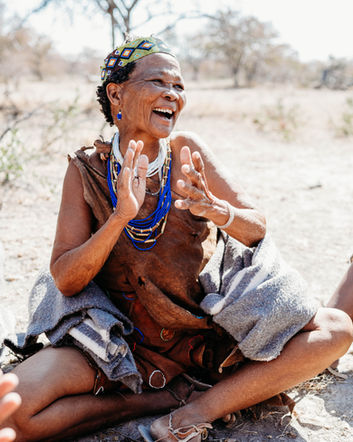 Bush Walk & Survival Skills:
• A San guide leading a bush walk in the Kalahari Desert.
• San tracker demonstrating hunting techniques.
• San woman showing traditional plant medicine.
• A San man explaining how to use natural materials for healing.
• A San guide pointing out animal tracks in the sand.
Cultural Interaction:
• San people welcoming visitors with hugs.
• Family interacting with San community members.
• A San group teaching a traditional game in the Kalahari.
• Visitors learning cultural traditions from the San people.
• San community demonstrating teamwork through a traditional game.
Portrait & Scenery:
• Portrait of a San elder in the Kalahari Desert.
• Traditional San clothing and ornaments.
• San children laughing and playing outdoors.
• Scenic Kalahari Desert view during the bush walk.
• Group photo with the San people in the Kalahari.