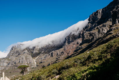 Coastal & Ocean Views
•	Scenic coastline view in Cape Town with waves and cliffs.
•	Ocean landscape along Cape Town’s shoreline.
•	Sunset over the Atlantic Ocean in Cape Town.
•	Aerial-style view of Cape Town’s beaches and coastline.
Table Mountain & Mountain Views
•	Table Mountain view under clear skies in Cape Town.
•	Mountain landscape surrounding Cape Town city.
•	View of Lion’s Head rising above Cape Town.
•	Cloud cover rolling over Table Mountain at sunset.
Bo-Kaap & City Scenery
•	Colorful Bo-Kaap houses in Cape Town.
•	Street view of Bo-Kaap neighborhood with bright facades.
•	City view of Cape Town with mountain backdrop.
Camps Bay & Chapman’s Peak
•	Scenic view of Camps Bay beach and mountains.
•	Road view along Chapman’s Peak Drive.
•	Rocky coastline along Chapman’s Peak in Cape Town.
General Scenery
•	Panoramic view of Cape Town from a viewpoint.
•	Landscape photo capturing Cape Town’s mountains and ocean.
•	Sunrise or sunset over Cape Town’s natural scenery.
