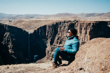 Culture & People:
• A Basotho man wearing a traditional Basotho blanket.
• Basotho people showcasing their cultural clothing and traditions.
• Local guide explaining Basotho customs in Lesotho.
• The Basotho family is standing in traditional attire.
• Horse rider in Lesotho’s mountain landscape.

Landscape & Scenery:
• Mountain views in Lesotho, the Kingdom in the Sky.
• Waterfall flowing through the mountains of Lesotho.
• Snow-covered peaks in Lesotho during winter.
• Scenic valley surrounded by mountains in Lesotho.
• High-altitude landscape in the Kingdom in the Sky.

Adventure & Travel:
• Driving along the Sani Pass mountain road.
• View it from the top of Sani Pass, overlooking South Africa.
• 4x4 vehicle navigating rocky terrain on Sani Pass.
• Mountain switchbacks on the route from Lesotho to South Africa.
• Scenic viewpoint along the Sani Pass route.

General Photos:
• Wide shot of Lesotho’s high-altitude countryside.
• Sunset or sunrise over the mountains of Lesotho.
• Family exploring Lesotho’s mountain trails.
• Traditional rondavel homes in the Lesotho highlands.
• Clear sky view showing Lesotho’s elevated terrain.