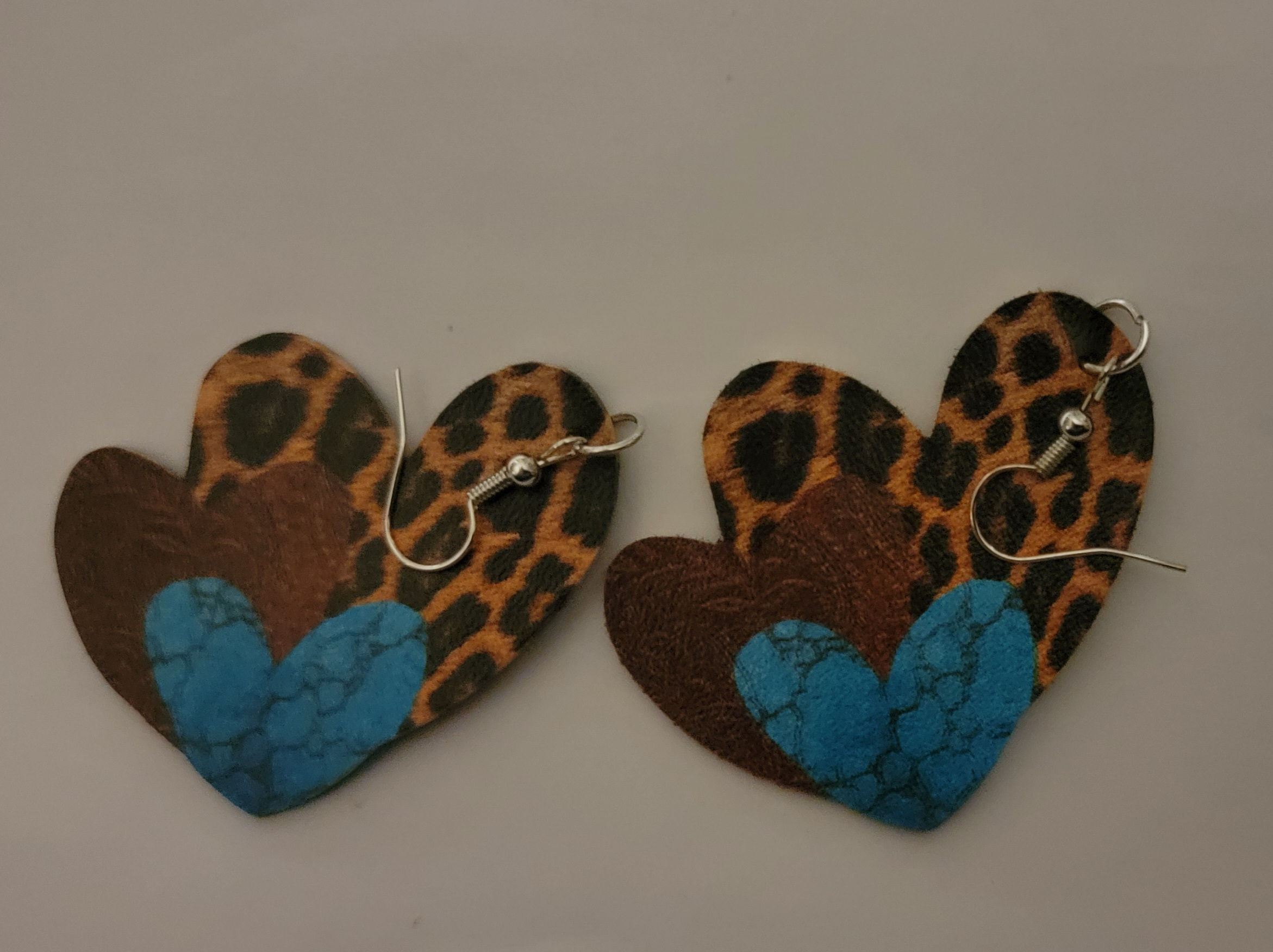Leopard love heart earrings 