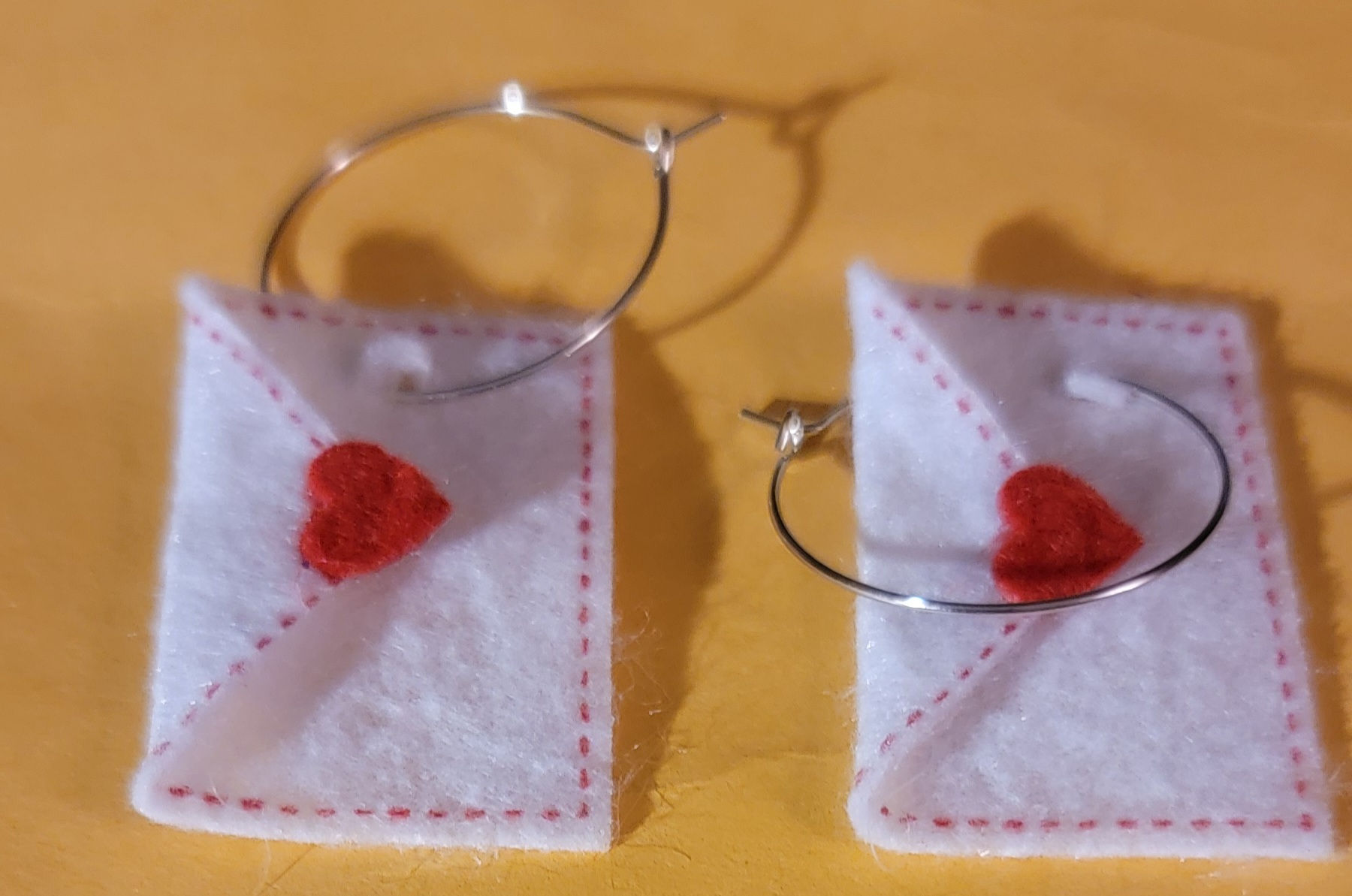 White envelope love earrings