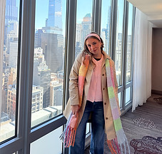 Mady Vivian in New York posing with the skyline