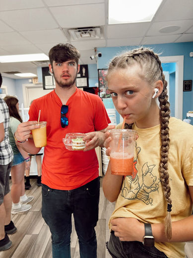 Teenagers enjoying refreshing drinks