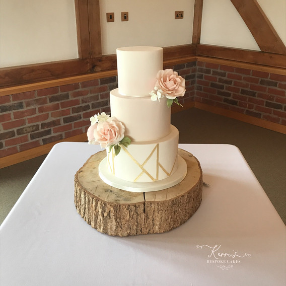 Blush pink and geometric gold cake