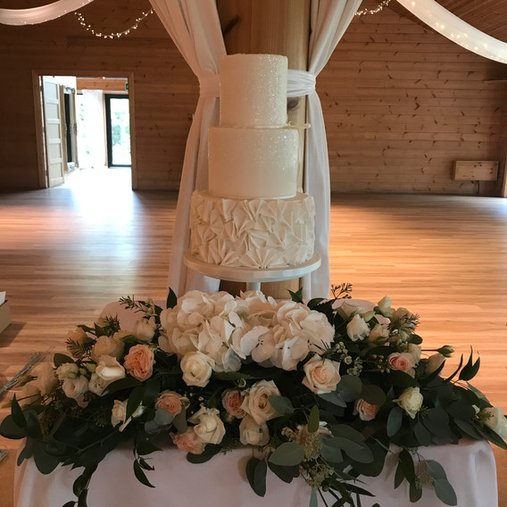 All white sparkle fan ruffle cake