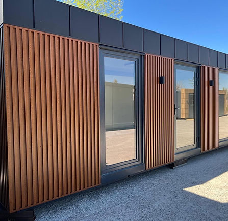 Modern modular retail pavilion with large shopfront windows
