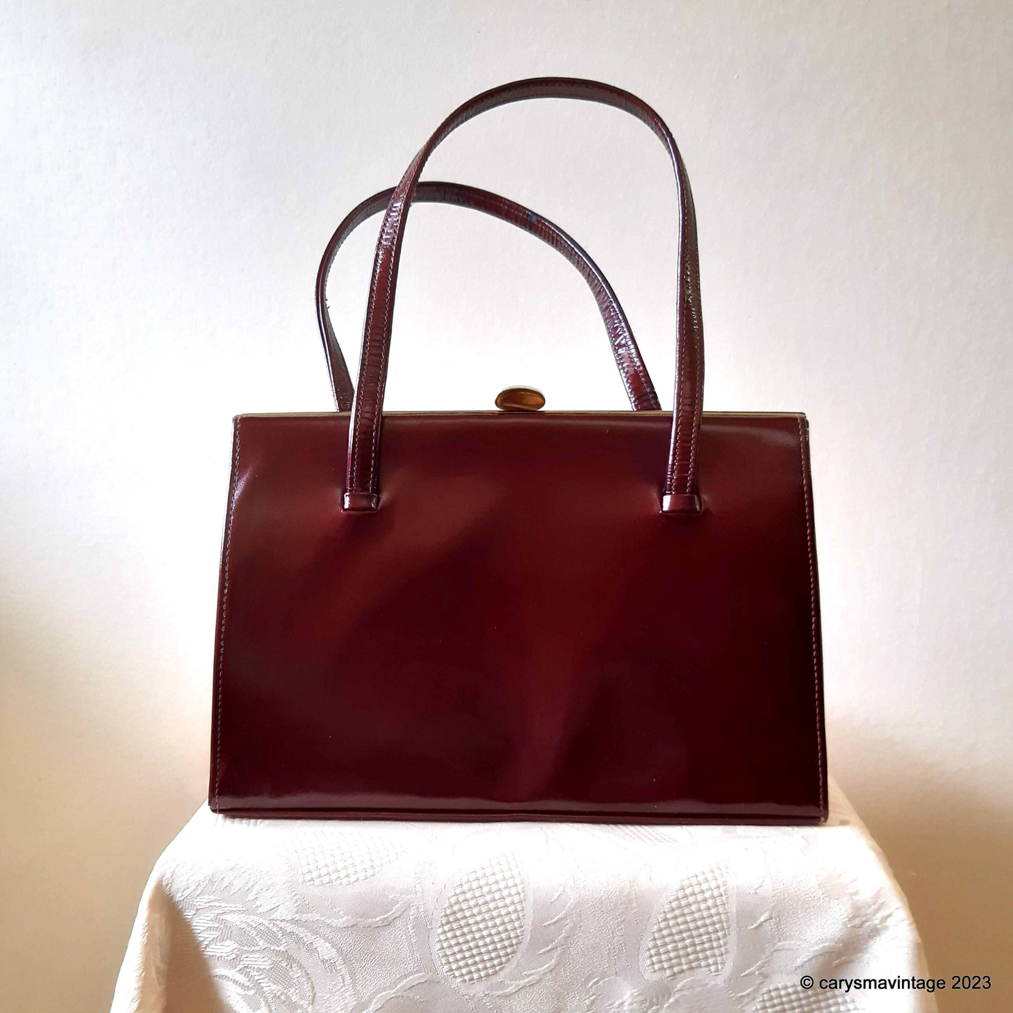 Meadows of Regent Street burgundy patent handbag
