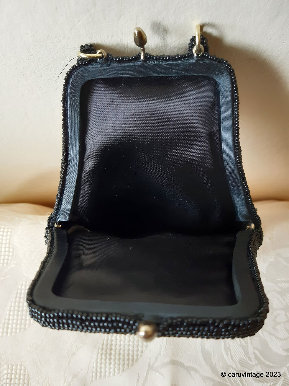 Thumbnail: Black beaded teardrop shaped evening handbag