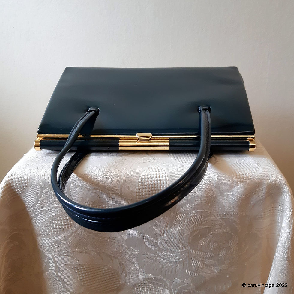 Thumbnail: Eros dark green patent classic style handbag