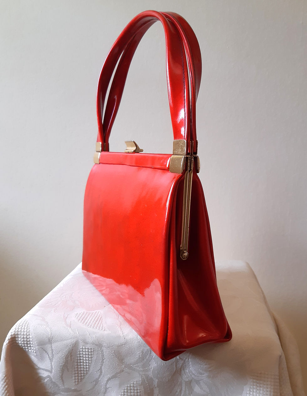 Thumbnail: Coral red patent handbag
