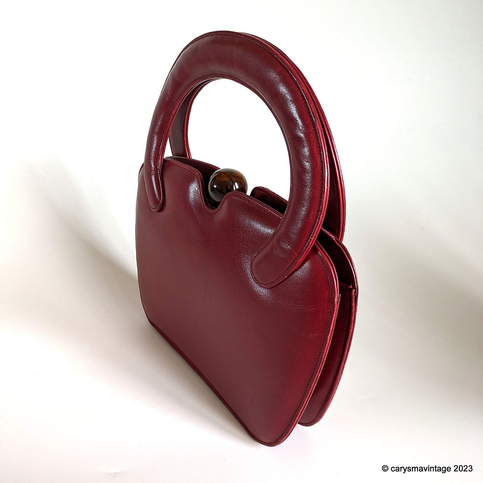 Thumbnail: 1940s/50s deep red leather handbag with amber effect ball clasp