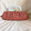 Thumbnail: Pexella terracotta/salmon peccary leather clutch bag with lucite handle