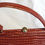 Thumbnail: Holmes glossy tan crocodile effect handbag