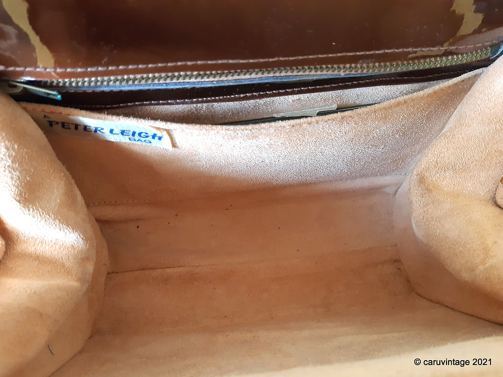 Thumbnail: Peter Leigh bronze brown patent handbag