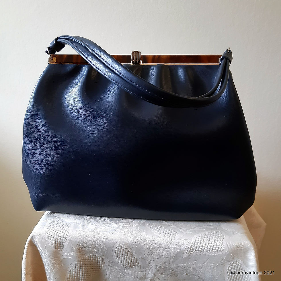 Thumbnail: Navy blue soft vinyl handbag with tortoiseshell effect top