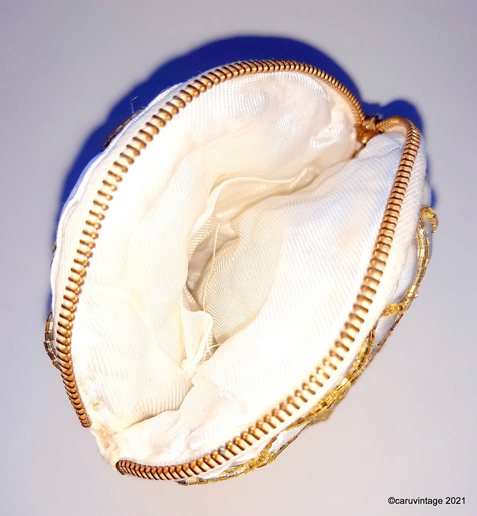 Thumbnail: Small ivory satin with gold beading pouchette with gilt coloured finger ring