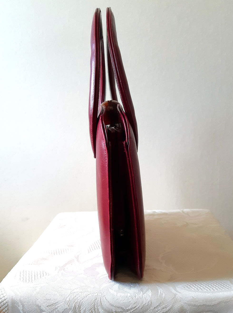 Thumbnail: 1940s/50s deep red leather handbag with amber effect ball clasp