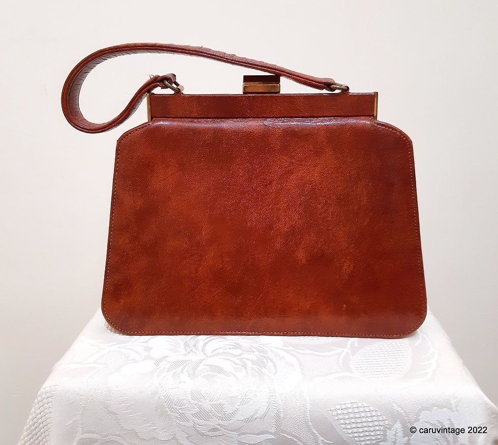 Thumbnail: Milch glossy mottled tan brown leather concertina style handbag