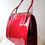 Thumbnail: Holmes red patent classic style handbag