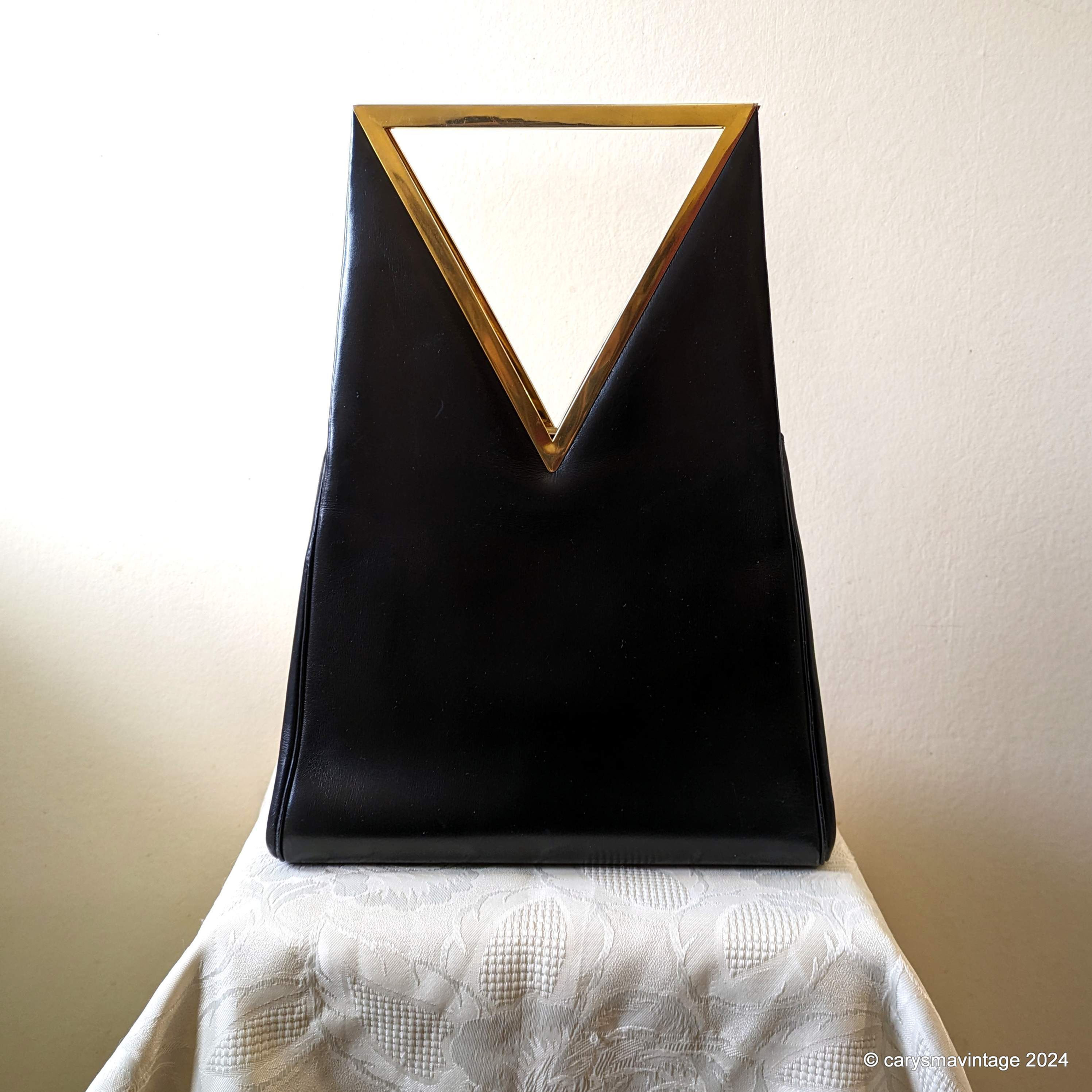 Birks, France black leather unusual style handbag