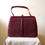 Thumbnail: Mappin and Webb burgundy red reptile effect handbag