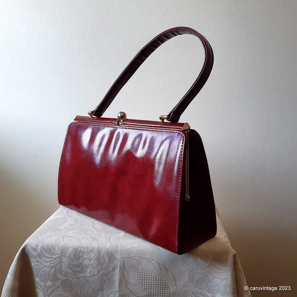 Thumbnail: Holmes deep red mottled effect handbag