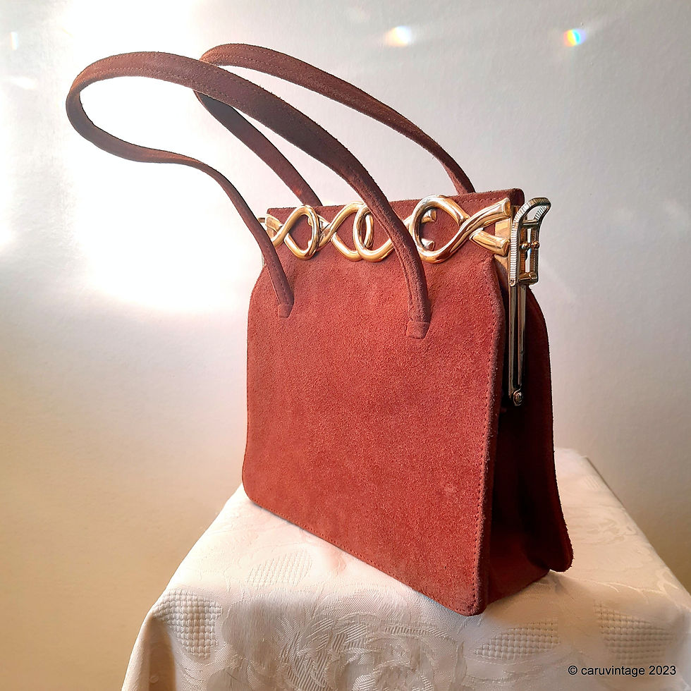Thumbnail: Copper tan suede handbag with pretty goldtone twist decoration