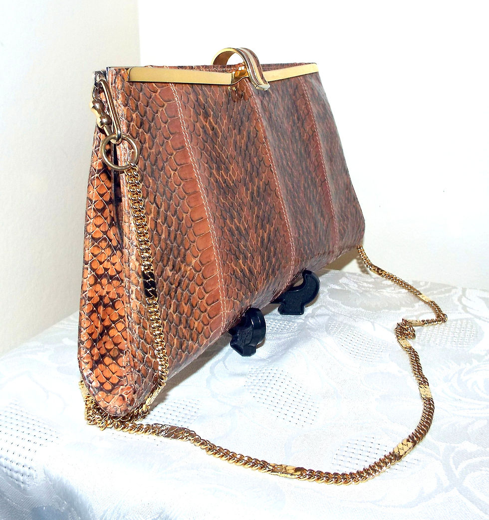 Thumbnail: Glossy tan snakeskin effect clutch or shoulder bag with chain strap
