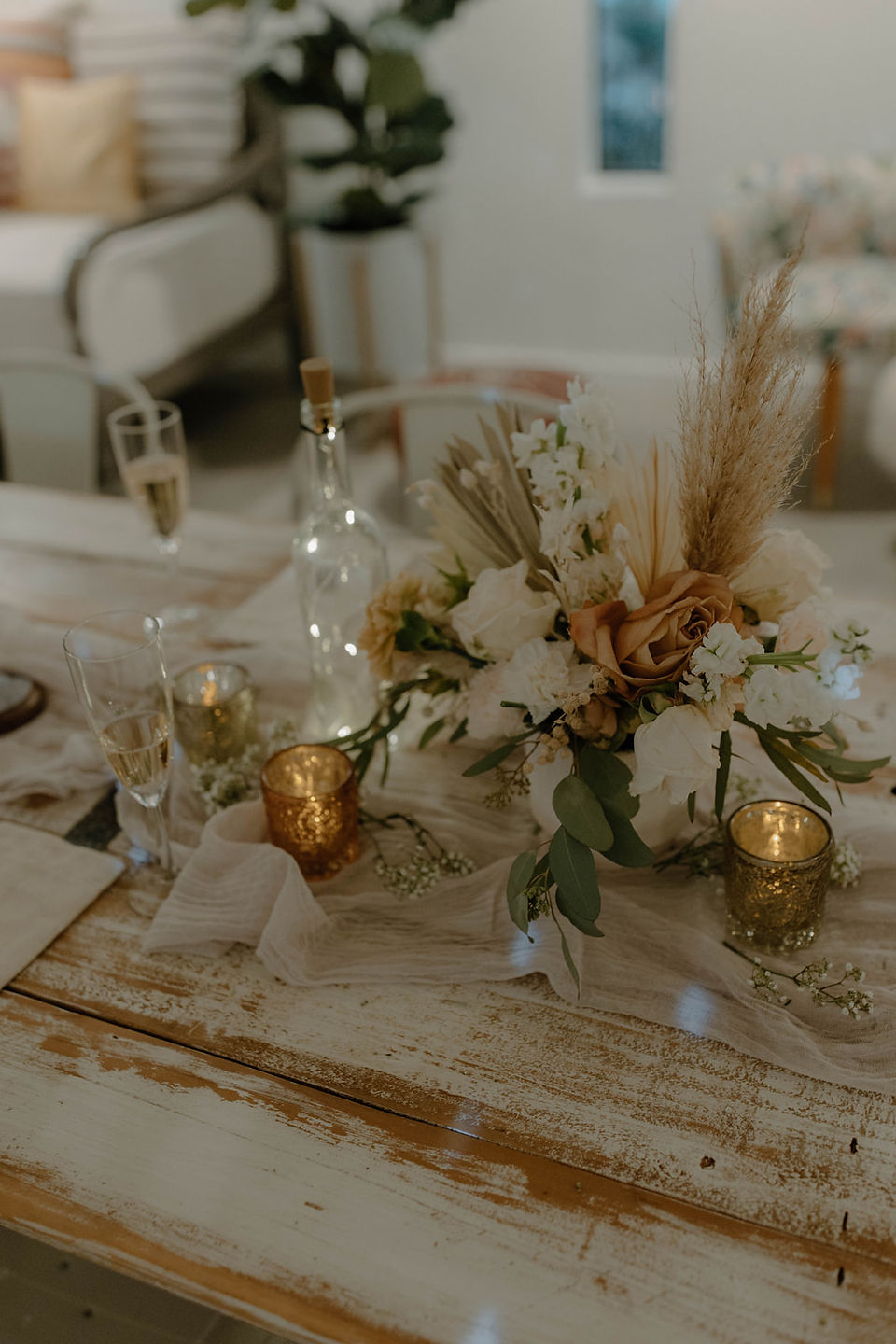 table setup with florals and candles for desert wedding
