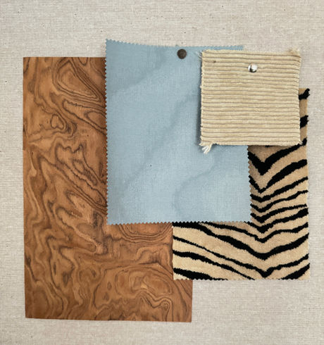 Moodboard design — échantillons matières bois, textile bleu et motif tigre