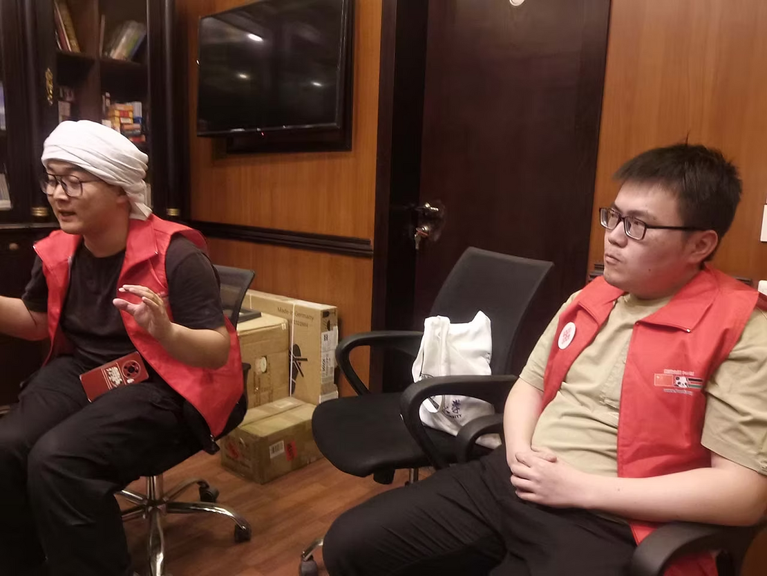 Photo: Xu Minghao from Panda Aid(left, Chinese-English translator) and Huang Shimin (right, responsible for coordinating the medical supplies shipment to Gaza) visit customs brokerage company in Nasr City, Egypt.