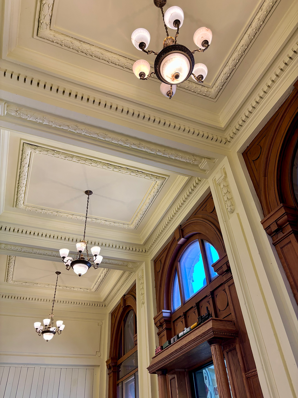 The interior of The Venango Museum, circa 2025. This image displays existing Beaux-Arts elements within the building.