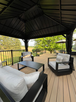 Modern composite deck with aluminum railing and modern furniture