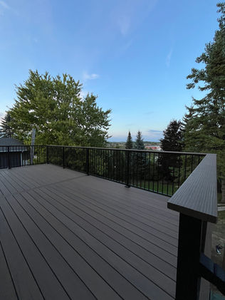 Composite Deck in Timbertech Pecan with Fortress Drink Rail
