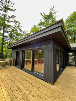 Modern cottage sided with Fraser wood siding
