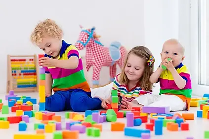 depositphotos_117913846-stock-photo-kids-playing-with-colorful-toy.jpg
