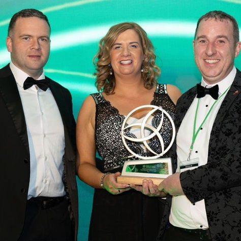 tusker team accepting irish steel award 2026