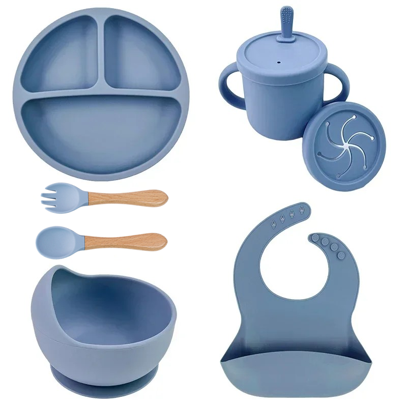Thumbnail: Blue silicone baby feeding set: plate, bowl, cup, spoon, fork, and bib
