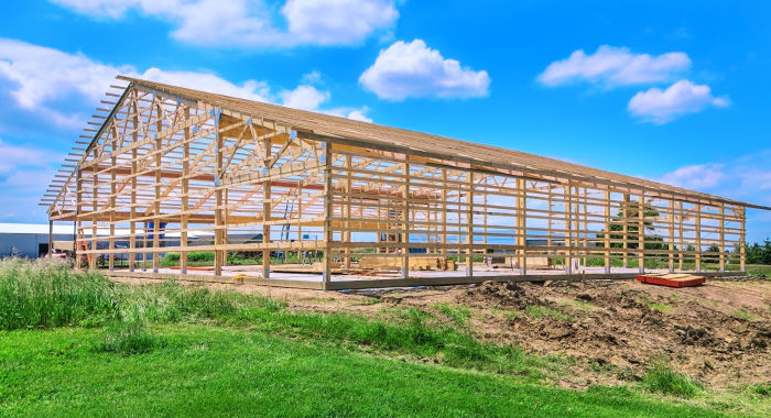 large barn building being framed