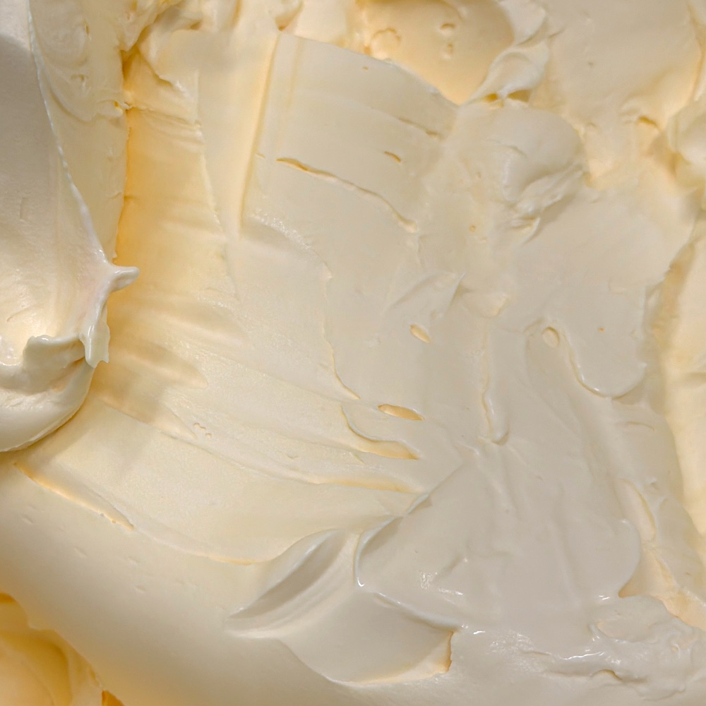 Scoop of Mango Creamsicle ice cream from Scoops on Tap