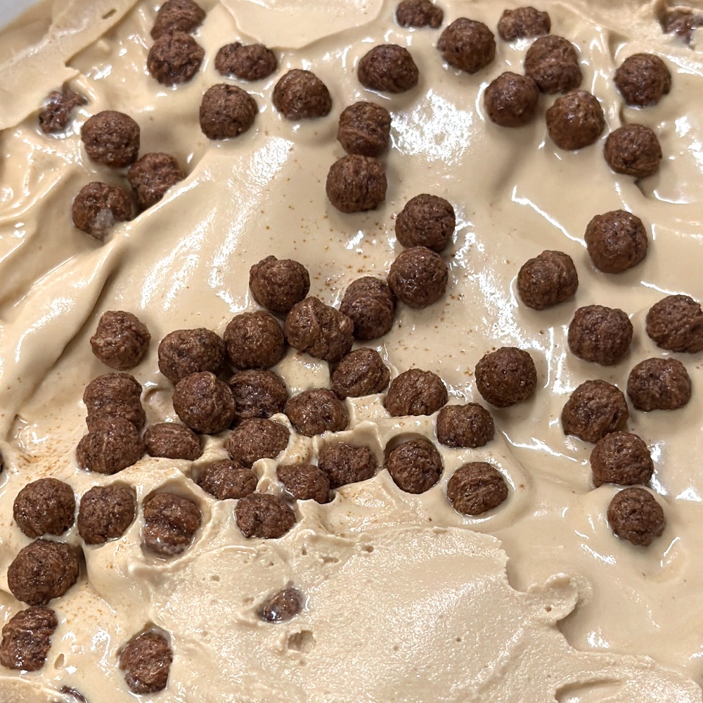 Scoop of Coffee Cocoa Puff ice cream from Scoops on Tap