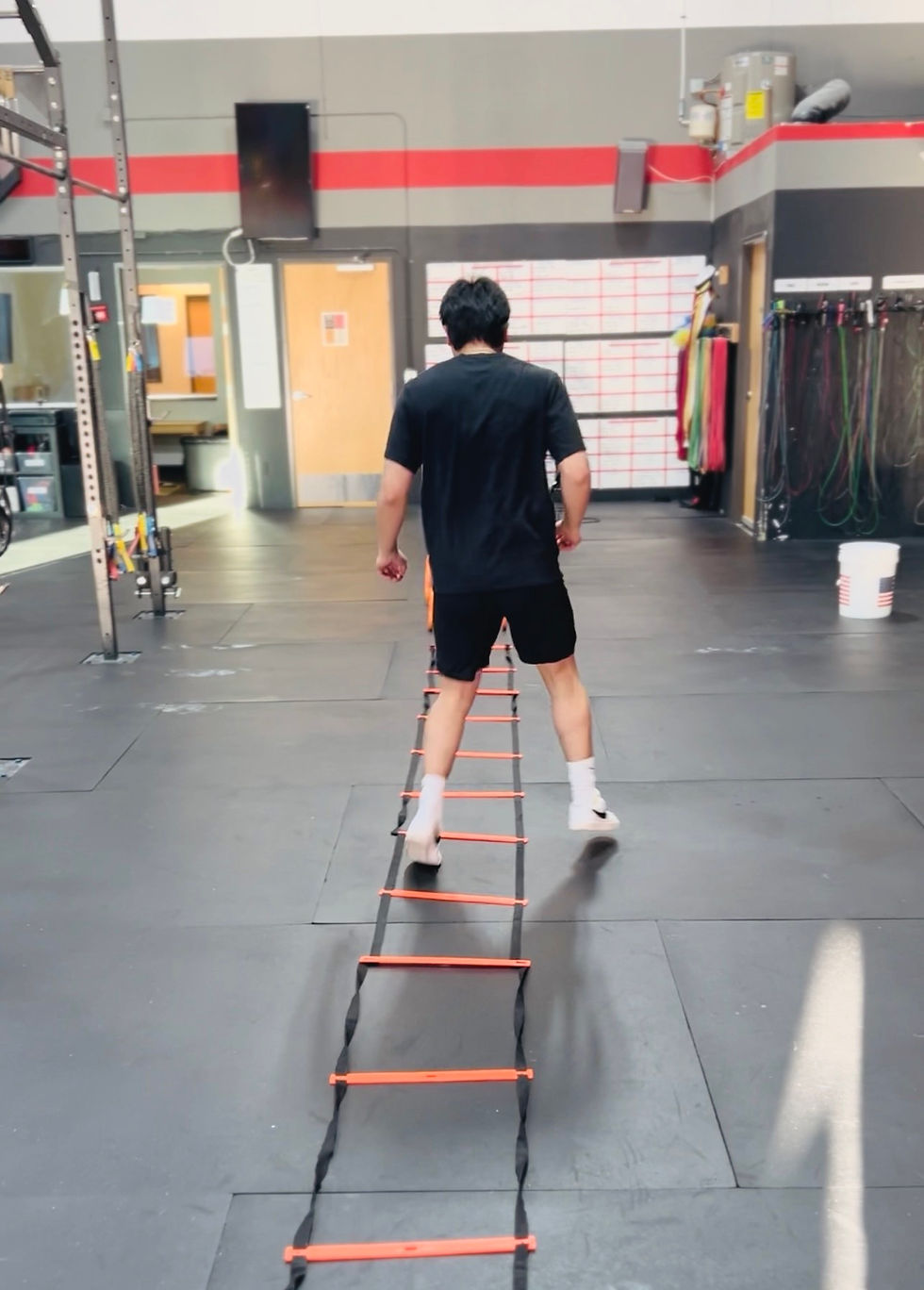 Runner warming up before a training run in Tualatin Oregon to help reduce running injury risk and prepare for Hood to Coast training