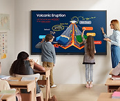 Teacher and students learning about volcanic eruption