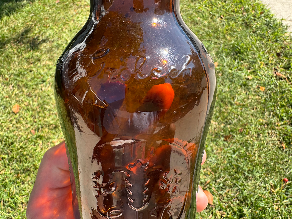 Thumbnail: GROLSCH bottle with topper