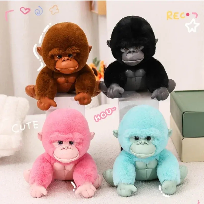 A group of four sitting gorilla plush toys in brown, black, pastel pink, and pastel blue, arranged together with cute doodles