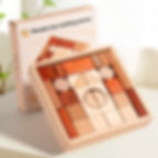 A polished wooden storage box filled perfectly with geometric construction blocks, shown leaning against its white retail pac